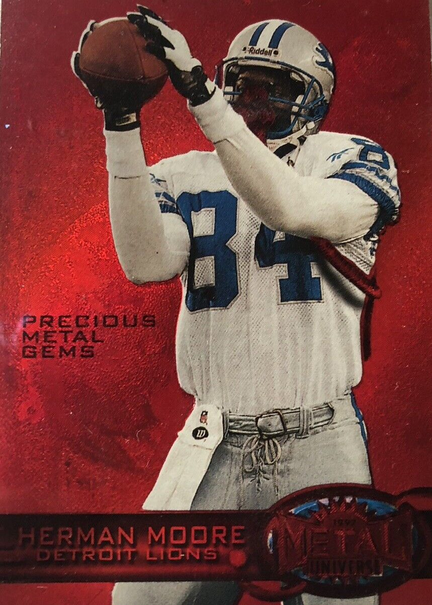 Herman Moore 1997 Metal Universe #114 Precious Metal Gems Red /135 