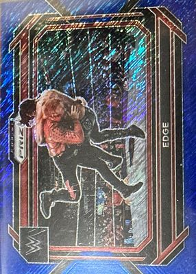 2023 Prizm WWE #100 Blue Shimmer /11