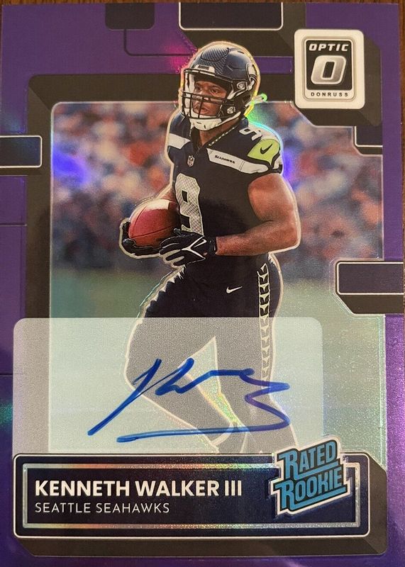 Kenneth Walker III 2022 Optic #218 Rated Rookie Autographs - Purple /35 Rookie RAW