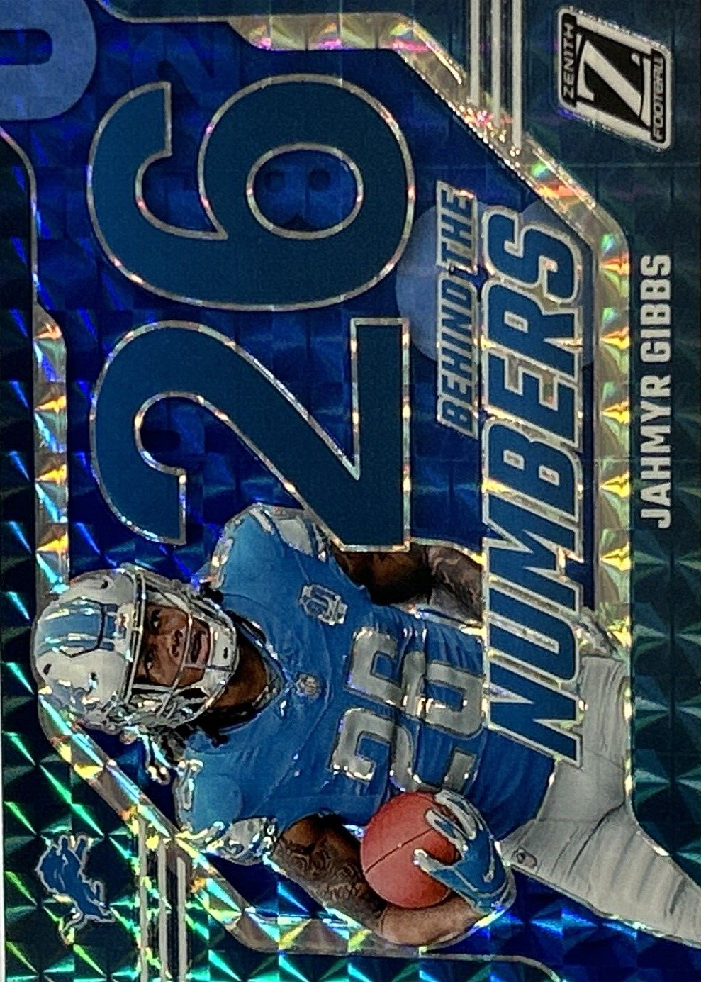 Jahmyr Gibbs 2023 Zenith #9 Behind the Numbers - Blue Price Guide