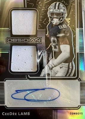 2020 Obsidian #RJI-7 Rookie Jersey Ink (/150)
