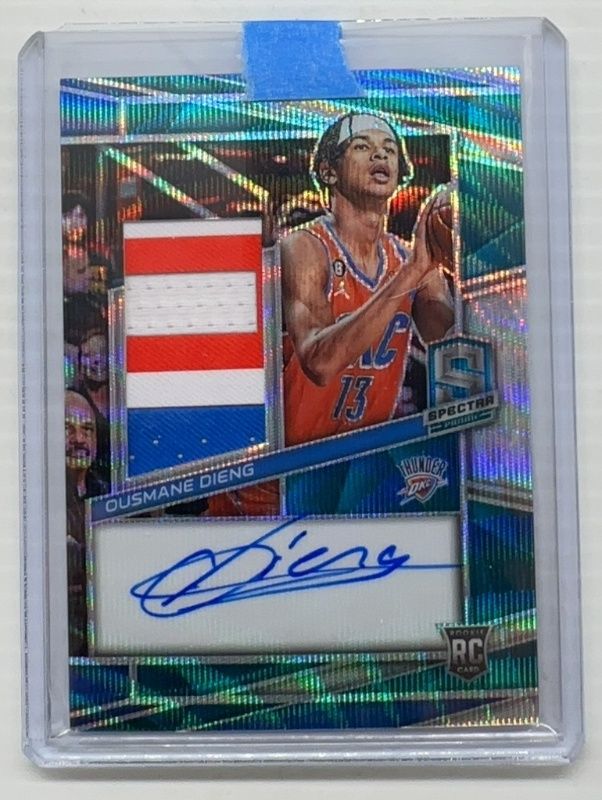 Ousmane Dieng 2022 Spectra #218 Rookie Jersey Autographs - Blue Wave FOTL /30 RAW
