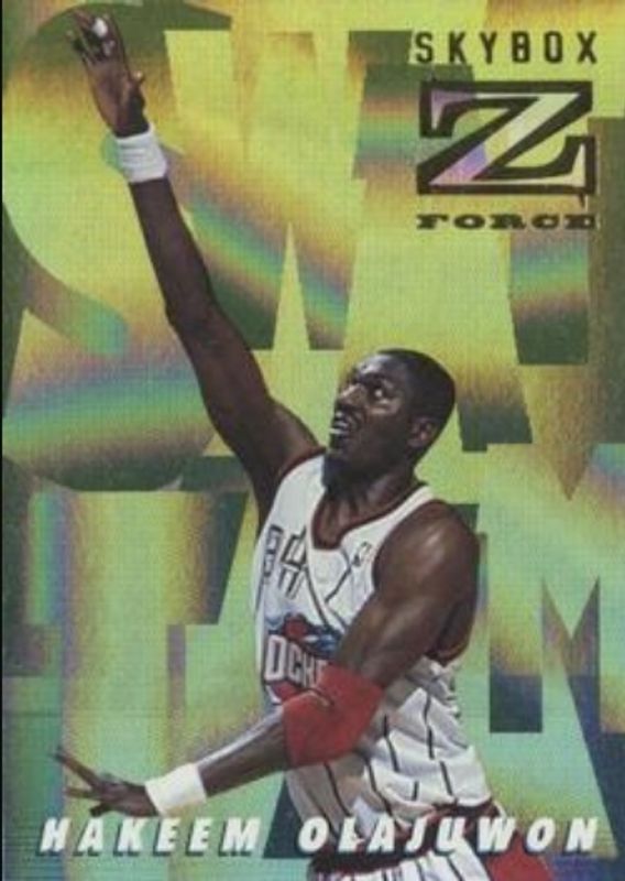 Hakeem Olajuwon 1996 SkyBox Z-Force #ST5 Swat Team RAW