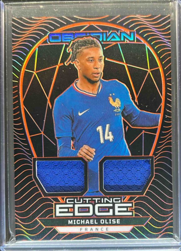 Michael Olise 2024 Obsidian #CE-MO Cutting Edge - Electric Etch Orange /99 RAW