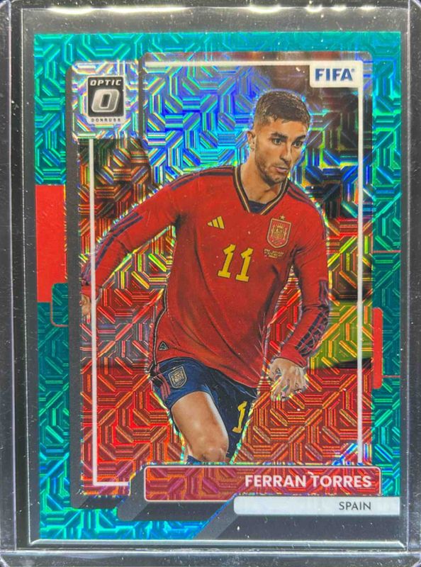 Ferran Torres 2022 Donruss #117 Optic - Teal Mojo /49 RAW
