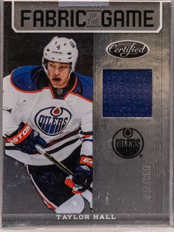 Taylor Hall 2012 Certified #FOG-TH Fabric of the Game /299 RAW