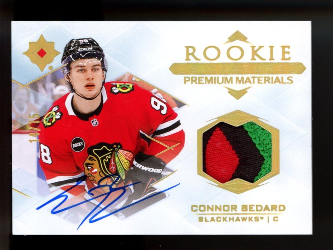 Connor Bedard 2023 Ultimate Collection #RSM-CB Rookie Signatures Premium Materials /65 RAW