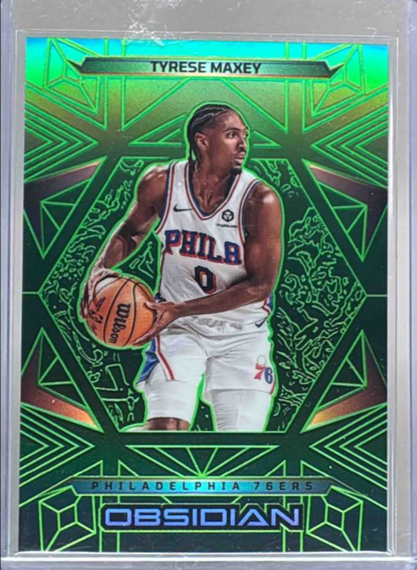 Tyrese Maxey 2024 Obsidian #77 Electric Etch Green Flood /25 RAW