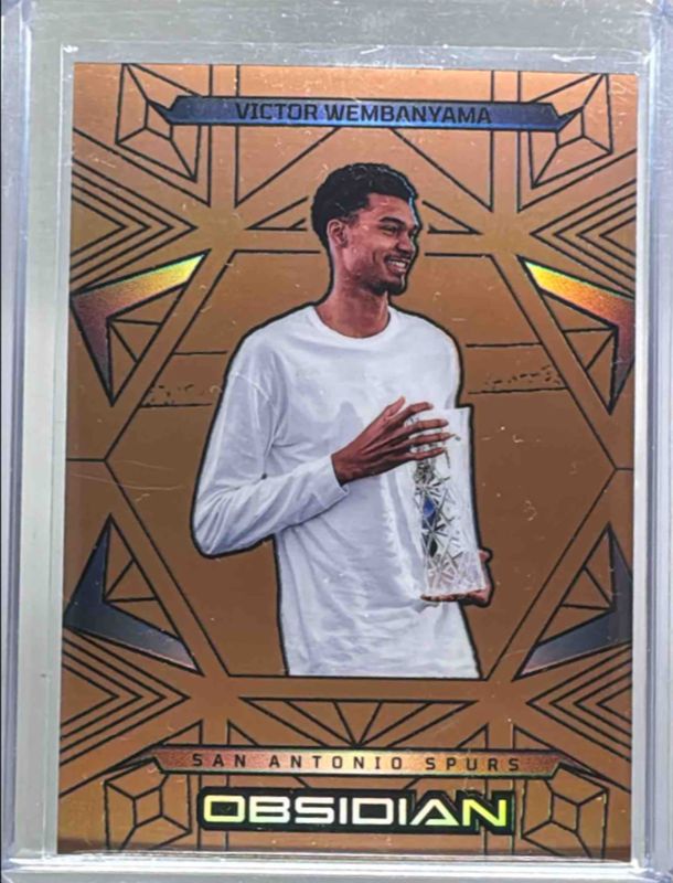 Victor Wembanyama 2024 Obsidian #191 Electric Etch Bronze Flood /99 RAW