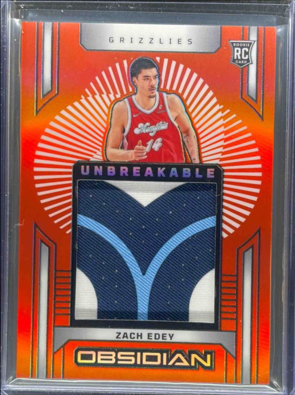 Zach Edey 2024 Obsidian #28 Unbreakable Memorabilia - Electric Etch Orange Flood /99 Rookie RAW