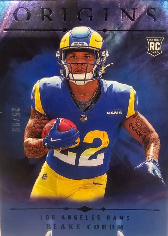 Blake Corum 2024 Origins #110 Holo Blue /99 Rookie RAW